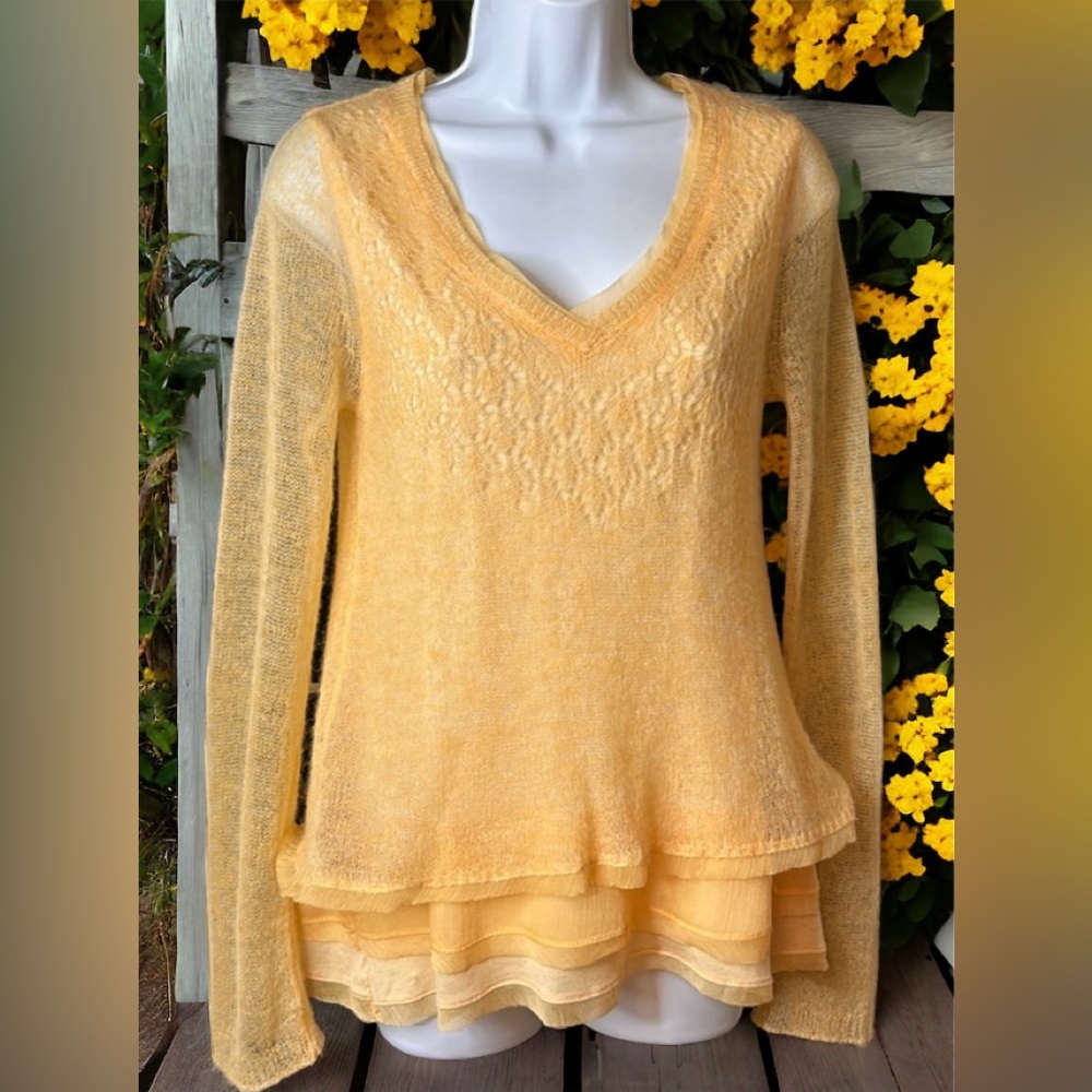 Knitted & Knotted sweater